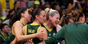 Lauren Jackson of Australia celebrates with team mates after their win over Belgium.
