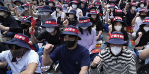 South Korea boasts a robust democracy:Financial Industry Union members stage a rally against the government’s labor policy this month.