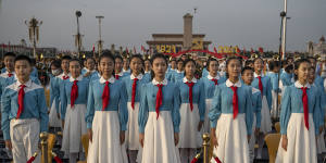 Chinese students sang patriotic songs to mark the centenary. 