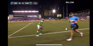 Sharks trainer Daniel Holdsworth runs past Jamal Fogarty as he attempts a conversion on Sunday night.