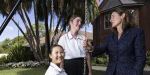 Students Alyssa Yee and Sophie Waters at Pymble Ladies’ College with principal Kate Hadwen.