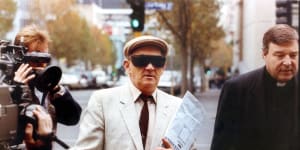 Gerald Ridsdale outside court in 1993,accompanied by George Pell.