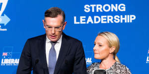 Premier Dominic Perrottet,with wife Helen,concedes defeat at the Liberal Party’s election event at the Hilton Hotel in Sydney.