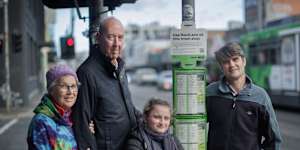 Matthew Wright (far right) is leading a campaign to make public transport permanently free in Victoria,with help from his niece Maya Wright (middle right) and fellow advocates Andrea Bunting (far left) and Dave Holmes (middle left).
