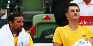 Pat Rafter and a young Bernard Tomic together during the 2012 Davis Cup for Australia.
