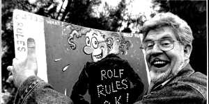 Rolf Harris with his famous wobbleboard in 1993.
