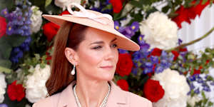 Princess Catherine in Dior greeting French President Emmanuel Macron and his wife Brigitte.