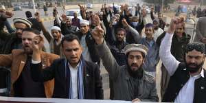 Members of Muslim Talba Mahaz Pakistan chant slogans in Islamabad,Pakistan,on Thursday,at a demonstration to condemn the Iran strike in the Pakistani border area.
