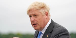 British Prime Minister Boris Johnson speaks to media at an RAF base on Saturday.