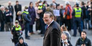 Bernie Finn on the steps of Parliament House after being kicked out of the Liberal Party.