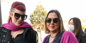 Lucy Dalston (left) and Sacha Wendt from South Australia came straight from the airport to queue at Beatrix Bakes in North Melbourne.