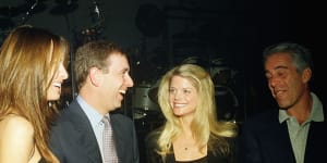 Prince Andrew with Jeffrey Epstein at a party at Mar-a-Lago in 2000. Melania Trump is on the left and US politician Gwendolyn Beck is third from left.