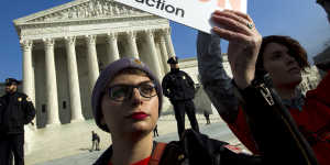 Abortion rights activists protest at the US Supreme Court during the March for Life in Washington. 