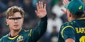Australia’s Adam Zampa,left,celebrates with teammate after the dismissal of Pakistan’s Usman Khan during the first T20 cricket match between Pakistan and Australia,in Lahore,Pakistan,Thursday,Jan. 29,2026. (AP Photo/K.M. Chaudary)
