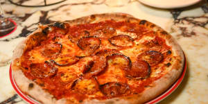 Louey’s pepperoni pizza is described as “fully loaded,very cheesy”.