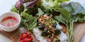 Bo Nuong La Lop (chargrilled beef wrapped in betel leaves).