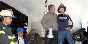 Firefighter who stood with Bush after 9/11 dies at 91