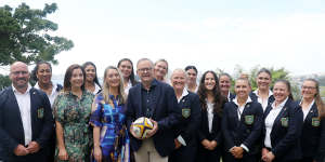 Wallaroos players with the Prime Minister at a funding announcement in February.