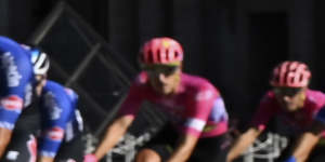 Jonas Vingegaard passes the Louvre en route to winning the Tour de France last year. 