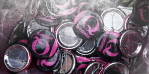 Q buttons for sale at a gathering of coronavirus sceptics on the eve of a planned protest march on August 28 in Berlin.