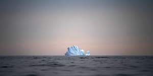 A large iceberg floats away near Kulusuk,Greenland,last year.