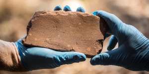 The discovery of this axe sharpening stone inside the Kakadu National Park has rewritten the history of Australia. 