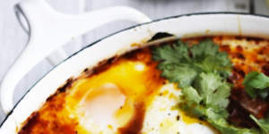 One-pot wonder:Baked eggs with chorizo sausage and cooling labna.