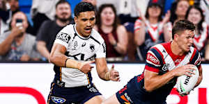 Deine Mariner chasing the Roosters’ Hugo Savala at Allianz Stadium on Saturday night.