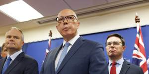 Opposition Leader Peter Dutton with Coalition energy spokesman Ted O’Brien,left,and Nationals Leader David Littleproud,right.