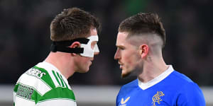 Celtic’s Callum McGregor and Ryan Kent of Rangers clash during last month’s derby in Glasgow.