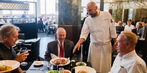 Rockpool head chef Corey Costelloe serves regular and former ABC chairman Maurice Newman (centre),author and journalist Fred Pawle (left) and The Australian’s commercial editor Steve Waterson..