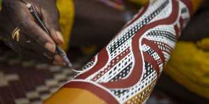 The sacred sounds of the didgeridoo (yidaki) calls to ancestors.