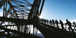 Ascending above the Sydney Harbour Bridge traffic.