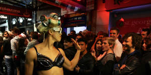 Crowds line up and await the arrival of Lady Gaga at the entrance to the Nevermind nightclub in 2011.