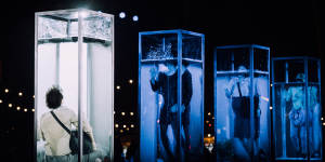 Korean company Elephants Laugh immersed themselves in transparent,vertical water tanks.