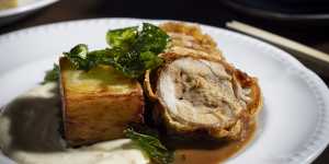 Roulade,featuring chicken breast encircling herbed mince,is tempura-fried so the skin is crackle-crisp.