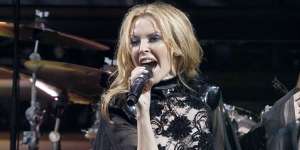 Kylie Minogue sings during the Scissor Sisters performance at the Glastonbury Festival 2010.