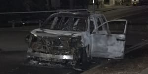 A burnt-out car in Bonnyrigg Heights on Monday.