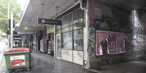 Abandoned and unleased shopfronts line Oxford Street in Darlinghurst.