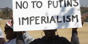 Not inside the meeting:Ukrainian supporters protest near the venue of the BRICS Summit in Johannesburg.