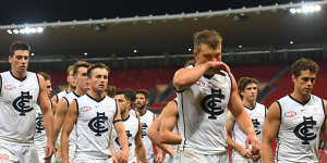 Carlton trudge off Giants Stadium after their latest humiliation on Sunday.