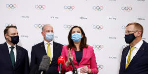 Brisbane lord mayor Adrian Schrinner and then federal Sports Minister Richard Colbeck,with Queensland Premier Annastacia Palaszczuk and John Coates speak to the media after Brisbane was announced as the 2032 Summer Olympics host city in July last year.