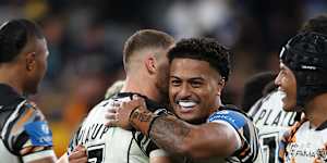 The Tigers celebrate a stunning win.