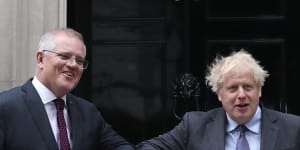 Giving the FTA a nudge ... prime ministers Scott Morrison and Boris Johnson outside Downing Street.