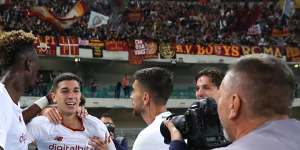 Cristian Volpato celebrates his goal for AS Roma in front of the away support section at the Bentegodi.