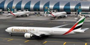 An Emirates plane taxis to a gate at Dubai International Airport at Dubai International Airport in Dubai,United Arab Emirates. 