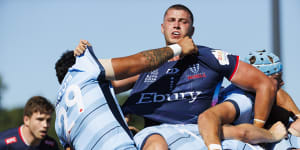 Melbourne Rebels lock Josh Canham is caught in a maul against NSW Waratahs.