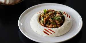 Tom Sarafian’s signature hummus topped with prawn and spanner crab.