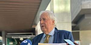 Clive Palmer outside the Brisbane Magistrates Court on Friday. 