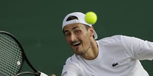 Tomic comes back from match point down to win in Chengdu